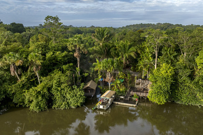 France, French Guiana, Kourou, the carbet (shelter) at Camp Maripas on the banks of the Kourou river (aerial view)