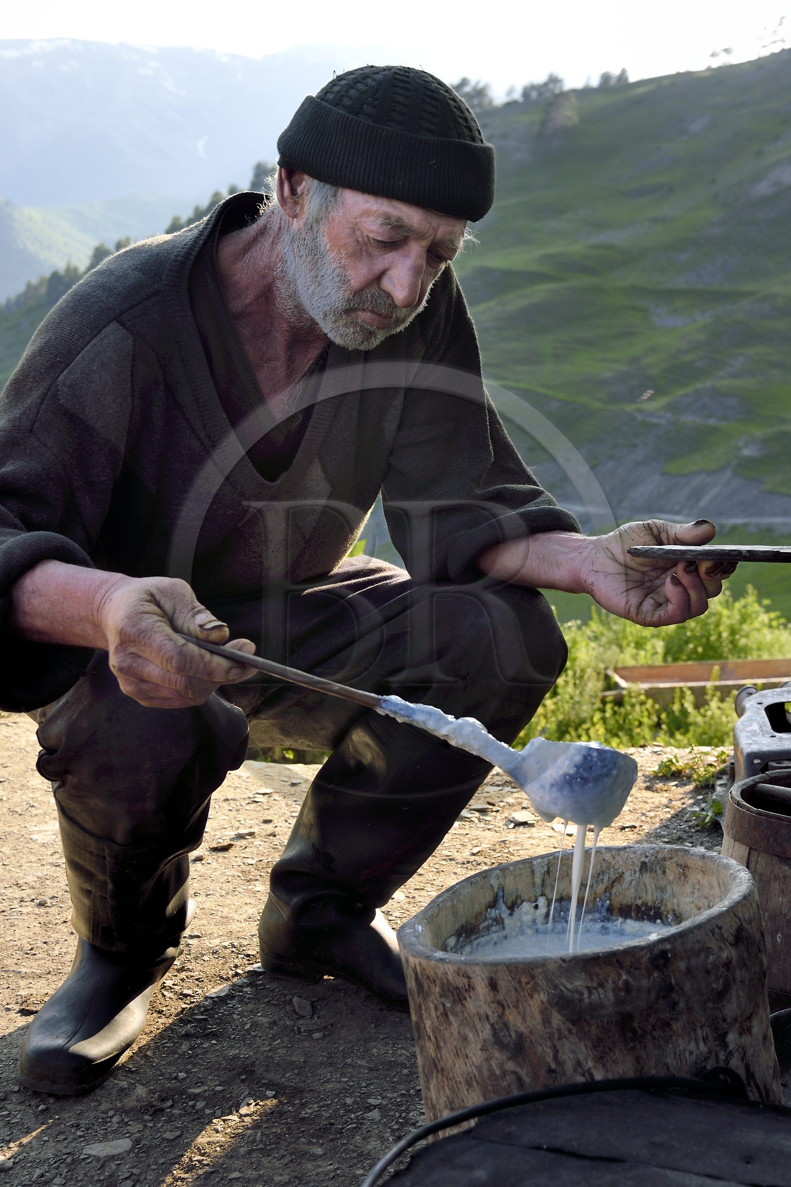 Georgia, Kakheti, Tusheti National Park, sheepfold not far from the village of Bochorna, the shepherd Kako makes his cheese in a traditional way