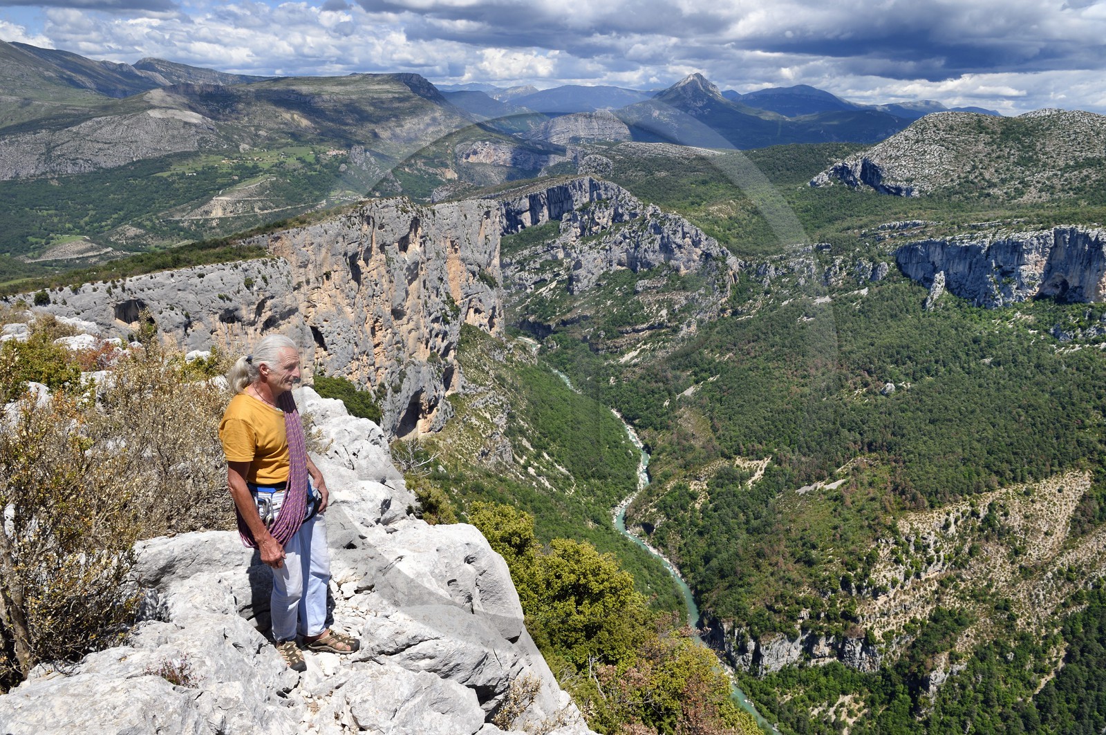 France, Alpes de Haute Provence, Parc Naturel Régional du Verdon, Grand Canyon of Verdon river, La Palud Sur Verdon, point of view of the Dent d'Aire, Bernard Gorgeon one of the pioneers of climbing in the massif and the Escalès cliff in the background