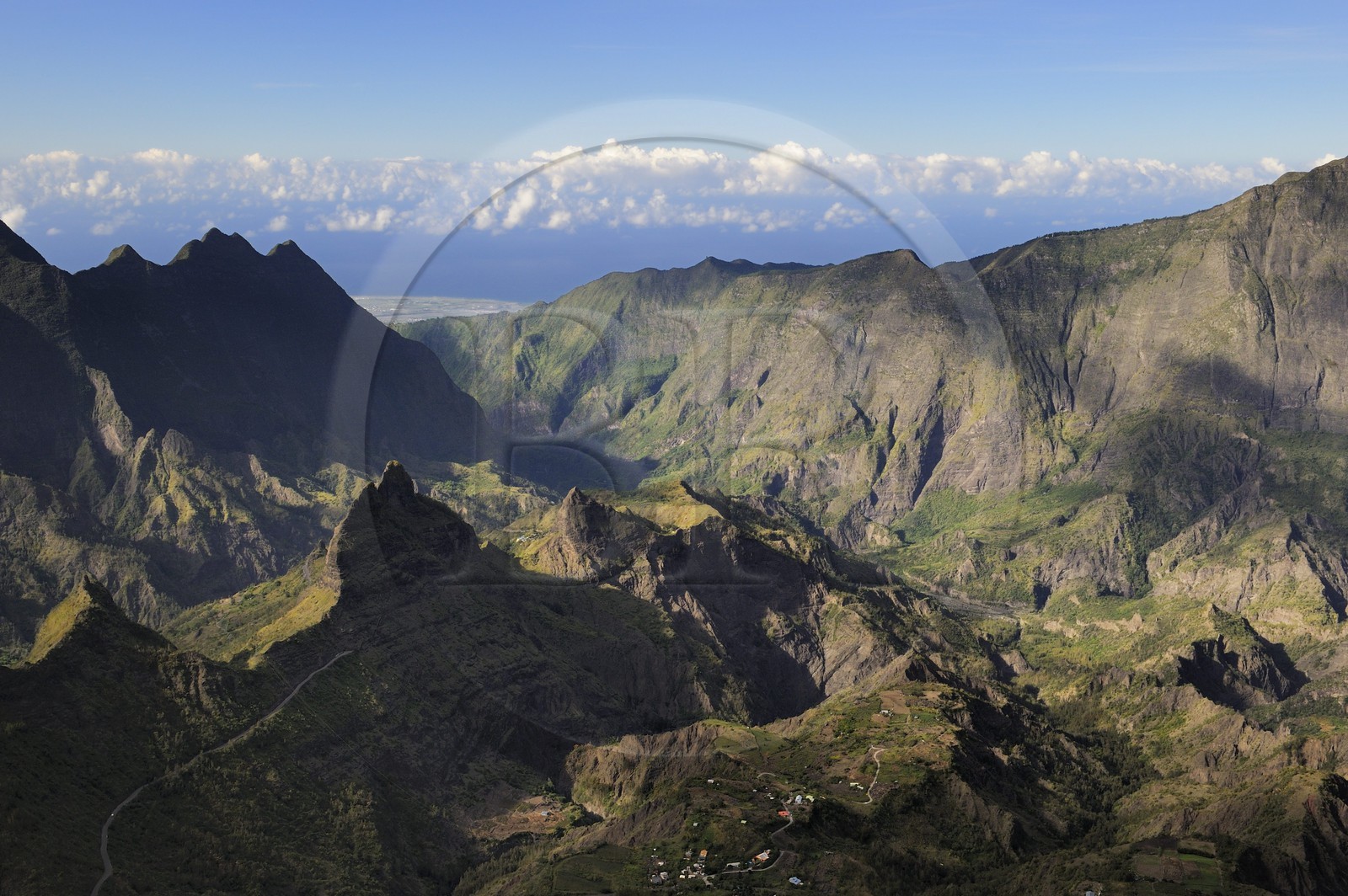 France, Reunion island (French overseas department), cirque of Cilaos, listed as World Heritage by UNESCO, and the West coast towards St. Louis in the background (aerial view)