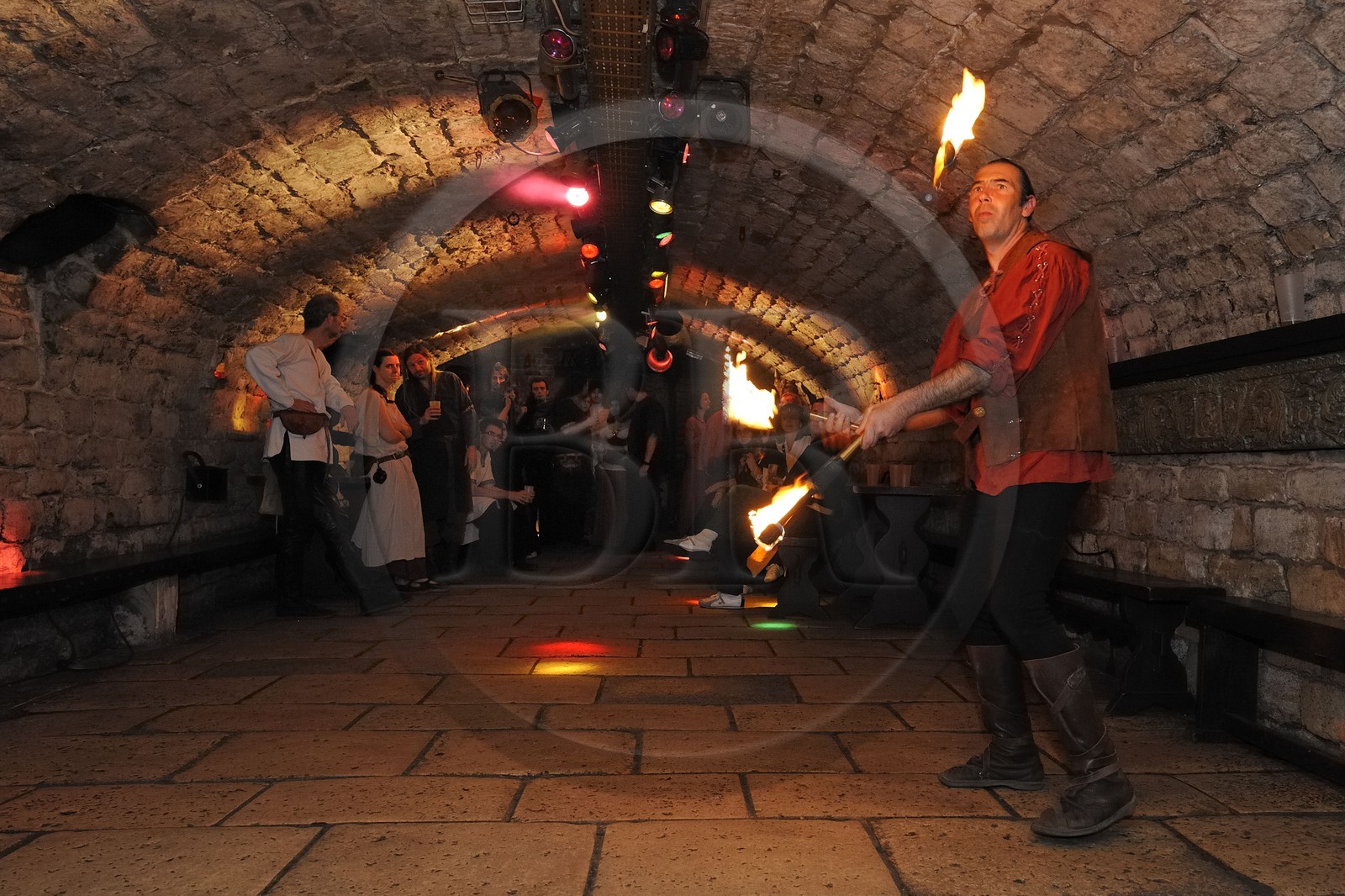 France, Paris, the Saint-Sabin cellars, medieval tavern, juggling with fire