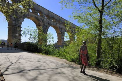 France, Gard, Massai in front of the Pont du Gard listed as World Heritage by UNESCO, Roman aqueduct