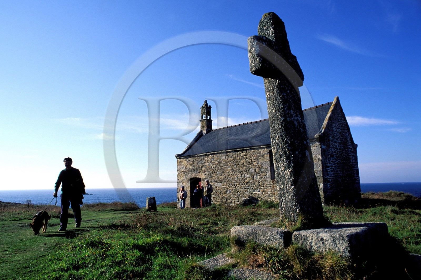 France, Finistere, stone cross in front of the Saint Samson chapel