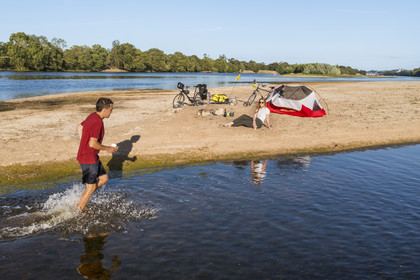 France, Maine-et-Loire, Loire valley listed as World Heritage by UNESCO, cycling along the banks of the Loire, camping for the night on one of the sandbanks forming islands on the Loire (aerial view)