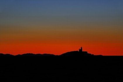 Italie, Toscane, phare au large de Portoferraio sur l’Ile d’Elbe au coucher de soleil