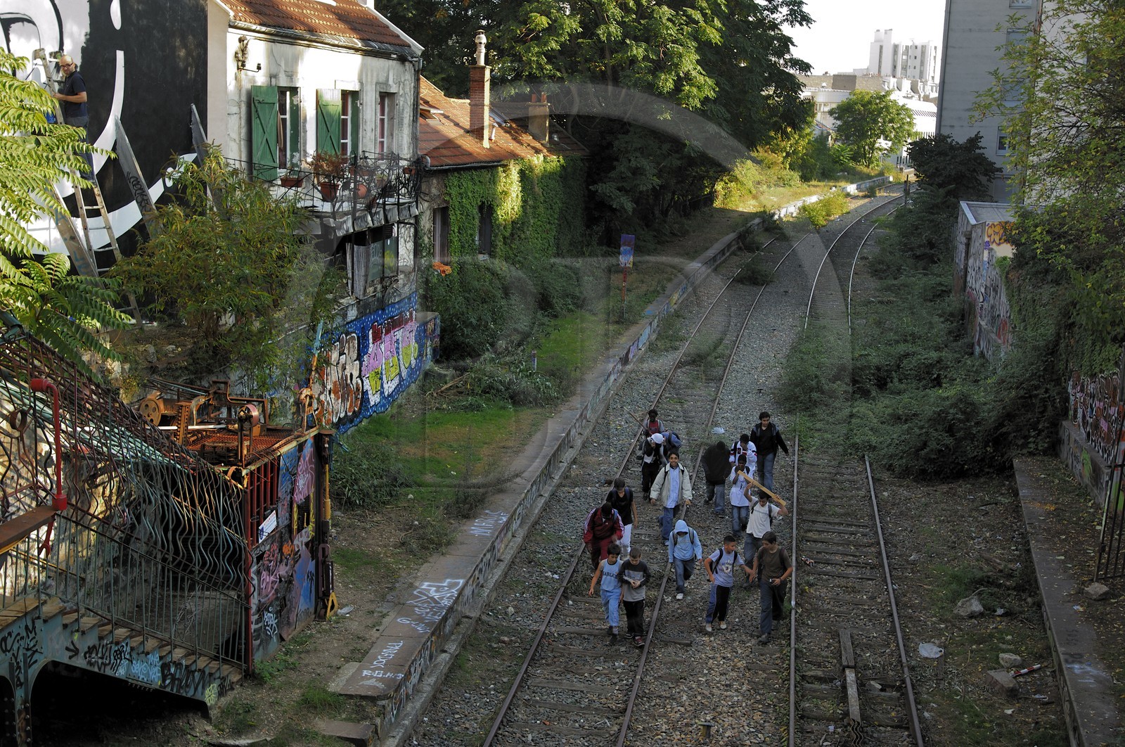 France, Paris, children on the Small Belt (golden arrow) old train line in Menilmontant