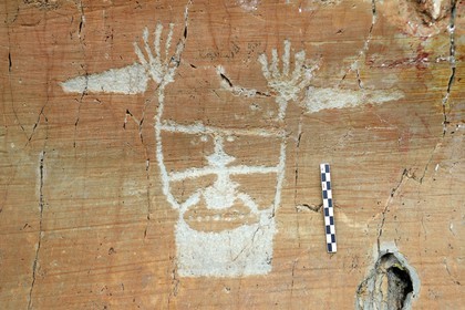 France, Alpes-Maritimes, parc national du Mercantour (Mercantour National Park), the Vallee des Merveilles (Valley of Wonders) scattered with thousands of rupestral engravings of the Bronze Age, hornlike anthropomorphized figure engraved on the so called rock of The Sorcerer on the chiappes yellow schist flagstones