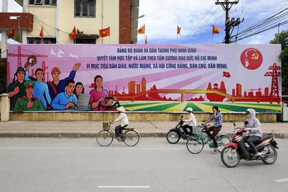 Vietnam, Ninh Binh, propaganda poster for the communist party