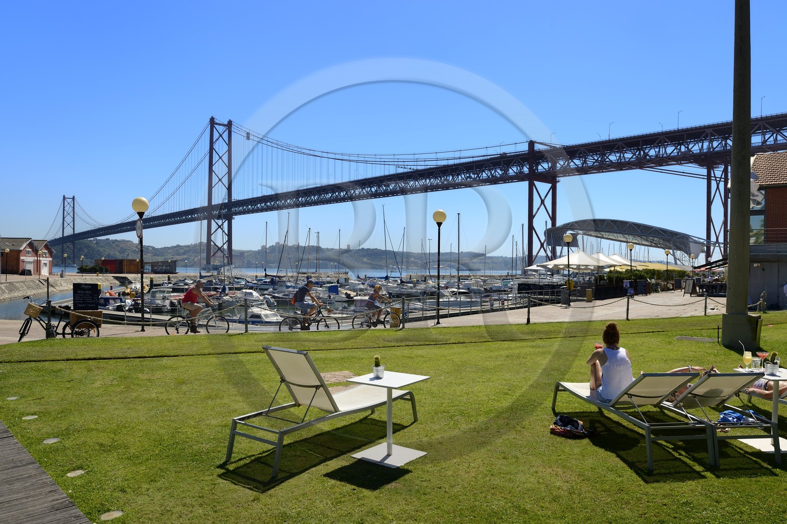 Portugal, Lisbon, 25 de Abril bridge on Tagus river seen from Doca de Santo Amaro