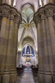 Spain, Catalonia, Barcelona, Eixample district, Sagrada Familia basilica by Catalan modernist architect Antoni Gaudi, listed as a UNESCO World Heritage Site, the neo-Gothic style temple crypt serves as a parish church, priest Joby Sebastian Kappiparambil celebrates mass
