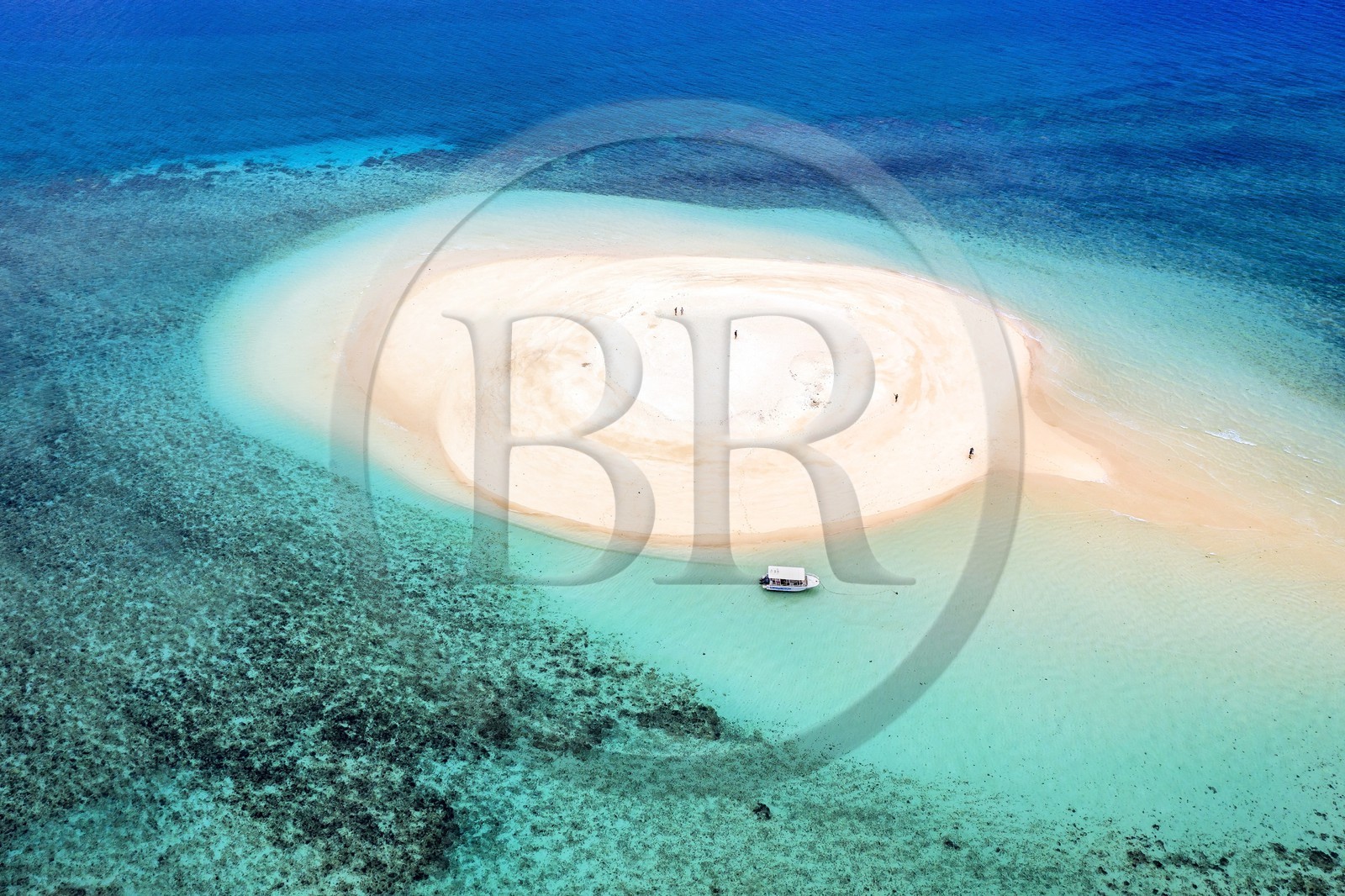 France, Mayotte island (French overseas department), Grande-Terre, M'Tsamoudou, islet of white sand on the coral reef in the lagoon facing Saziley Point (aerial view)