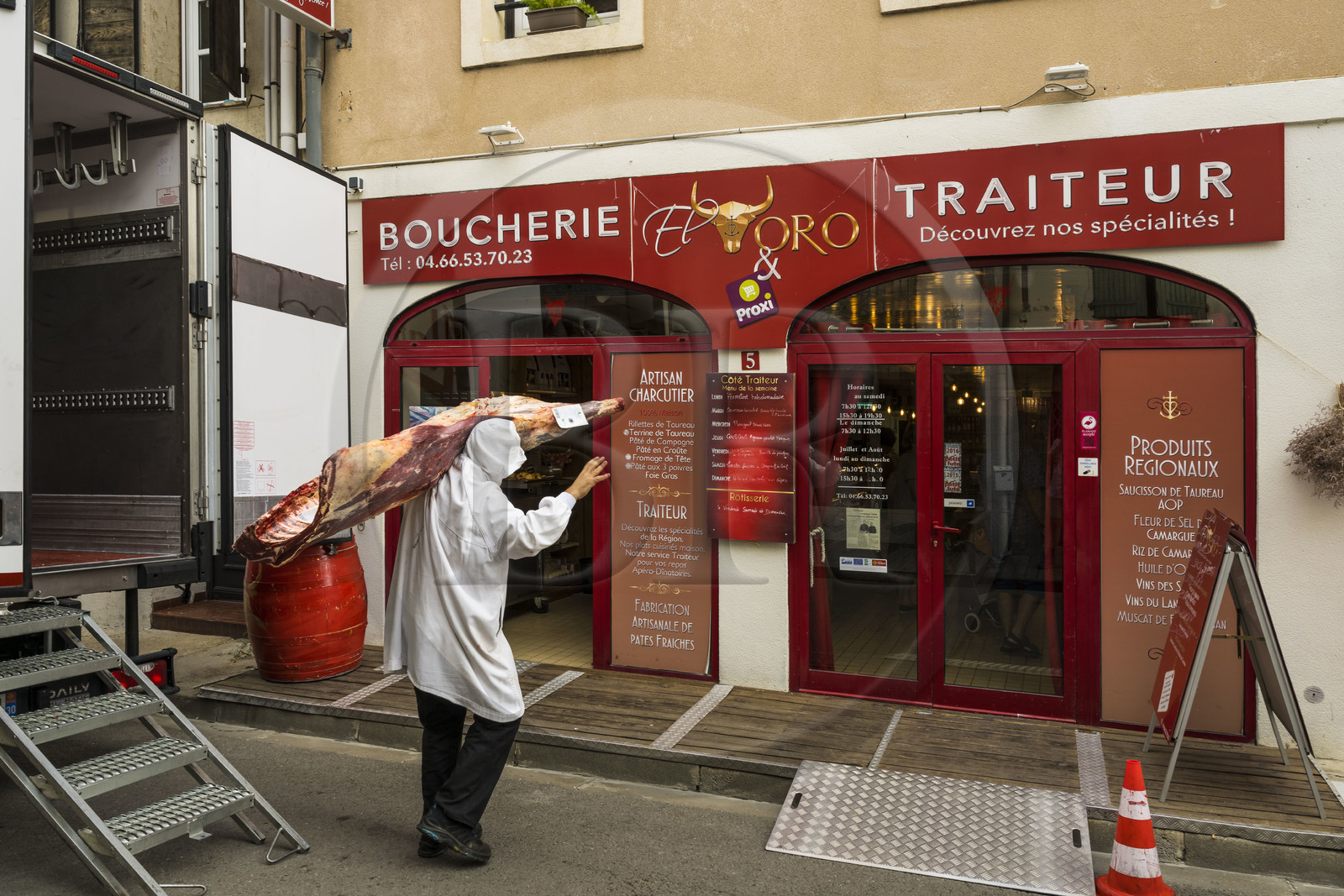 France, Gard, Aigues Mortes, delivery of a piece of meat to the bullfighting butcher