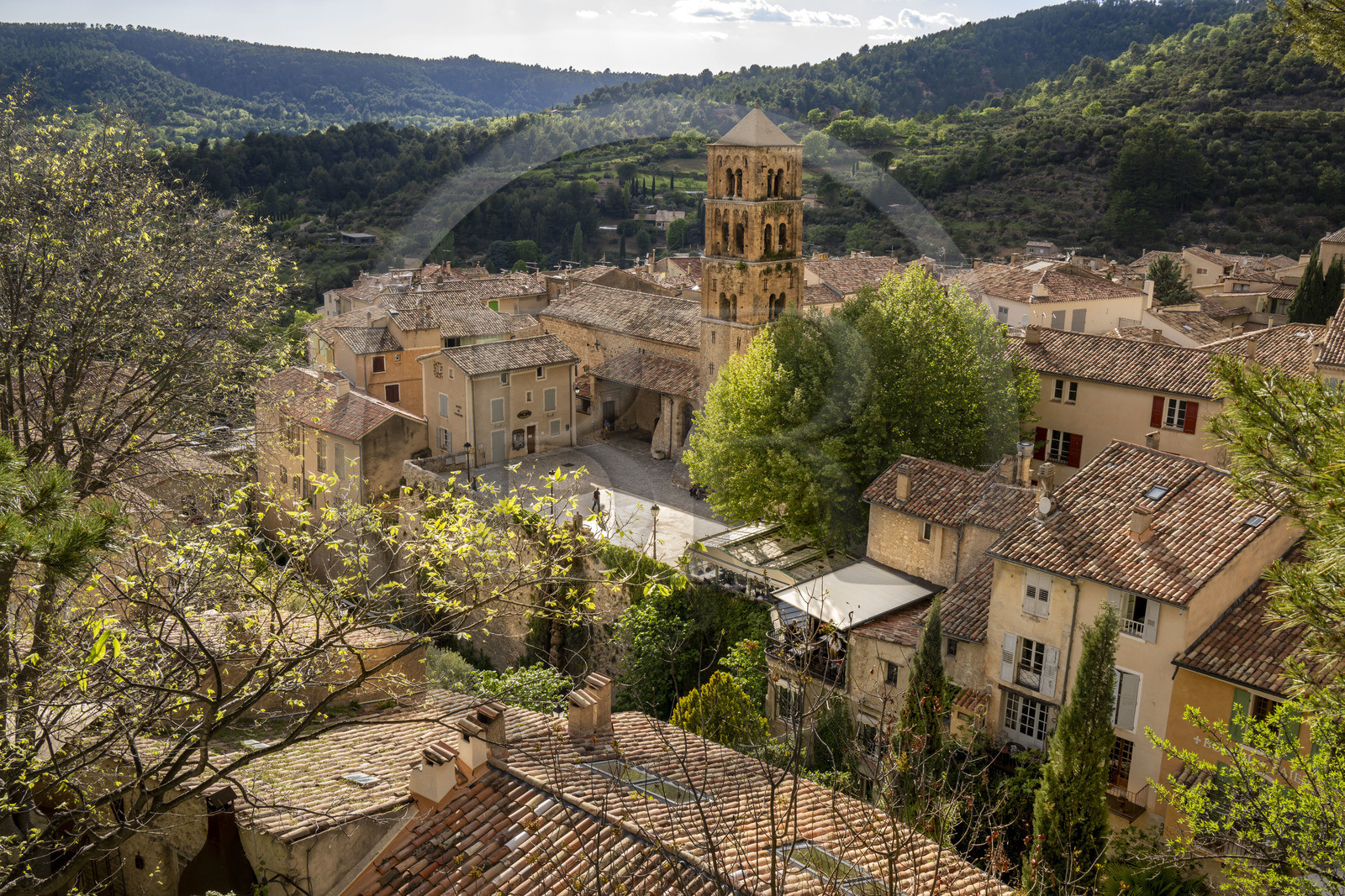 France, Alpes de Haute Provence, Parc Naturel Régional du Verdon, village of Moustiers Sainte Marie, labelled Les Plus Beaux Villages de France (The Most Beautiful Villages of France), the Notre-Dame-de-l'Assomption church with its 12th century bell tower