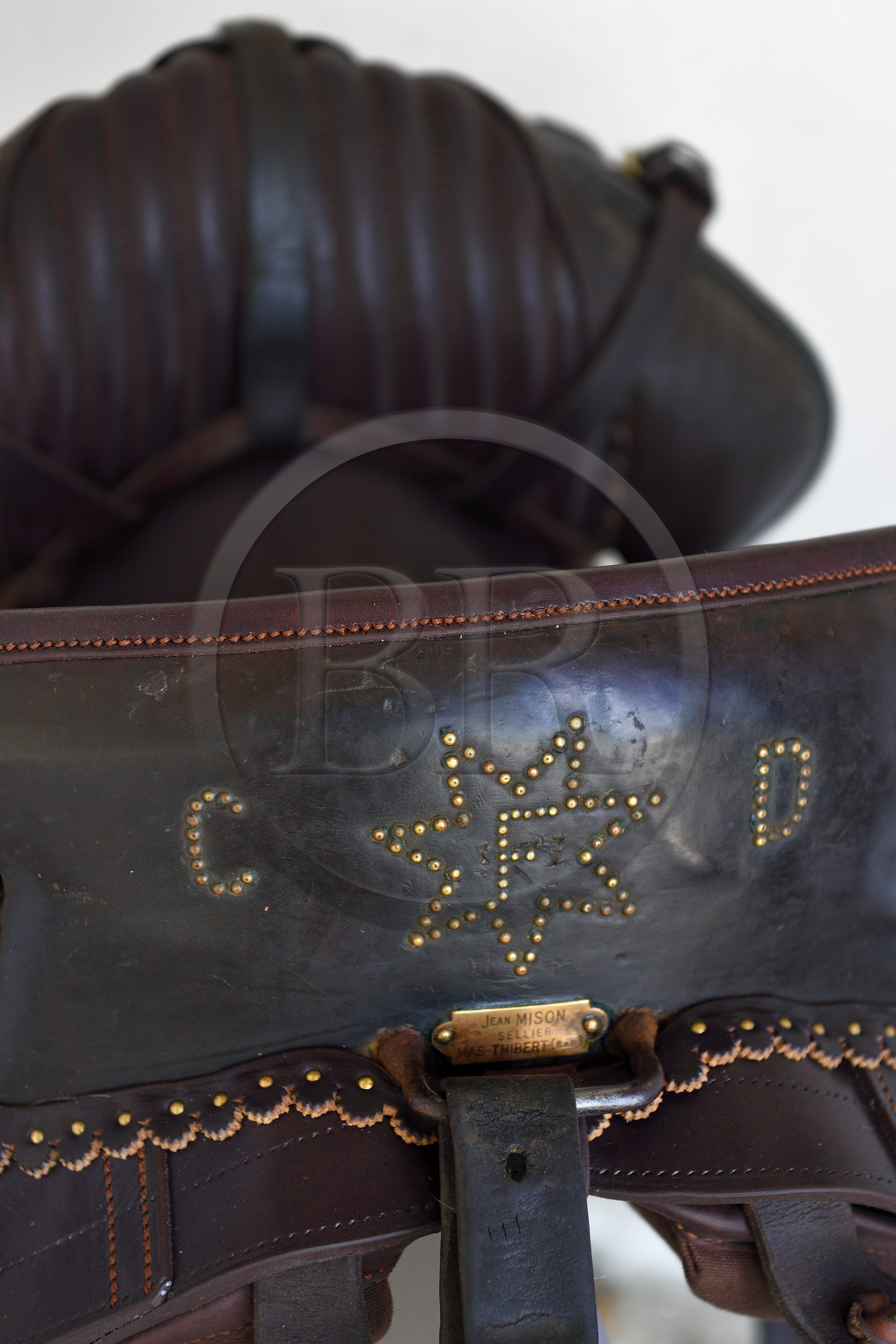 France, Bouches du Rhone, Les Saintes Maries de la Mer, the Mas Cacharel, saddle of camarguais gardian marked with the initials of the owner Florian Colomb de Daunant