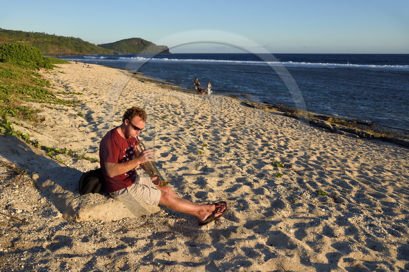 France, Reunion island (French overseas department), south coast, trumpet player on Petite-Ile beach