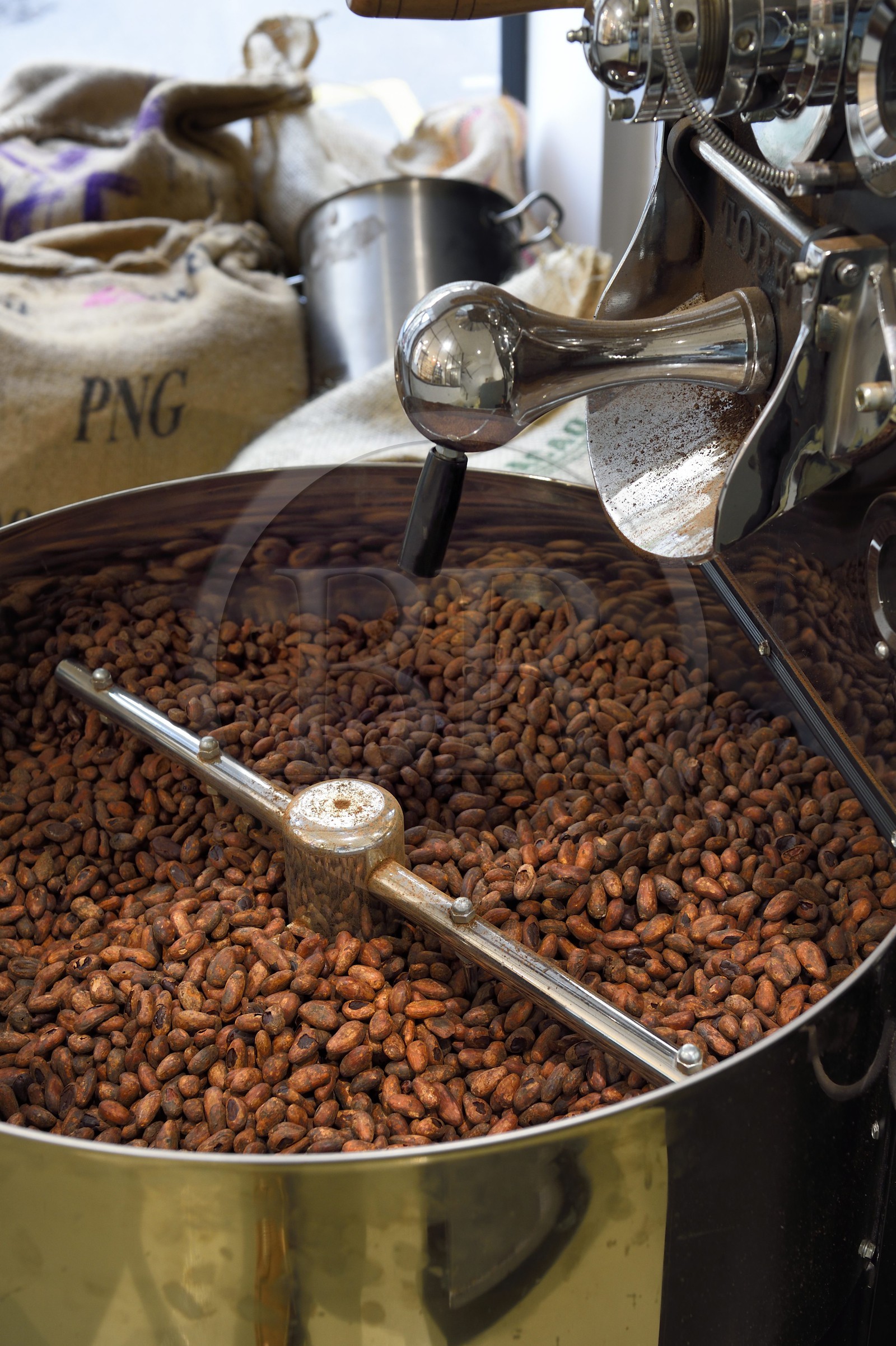 France, Pyrenees Atlantiques, Basque Country, Bayonne, cocoa beans in the roaster