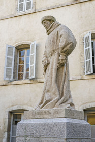 France, Cote d'Or, Beaune, area listed as World Heritage by UNESCO, Hospices de Beaune, Hotel Dieu, Founders' Courtyard, statue of Nicolas Rolin who created the hospices with his wife Guigone de Salins