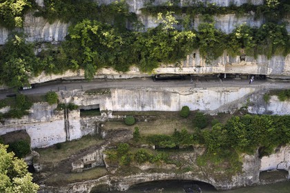 France, Dordogne, Perigord Noir, Vezere Valley, prehistoric site and decorated cave listed as World Heritage by UNESCO, Peyzac le Moustier, La Roque Saint Christophe Cliff, troglodytic site dating of the Prehistory, Rock shelters (aerial view)