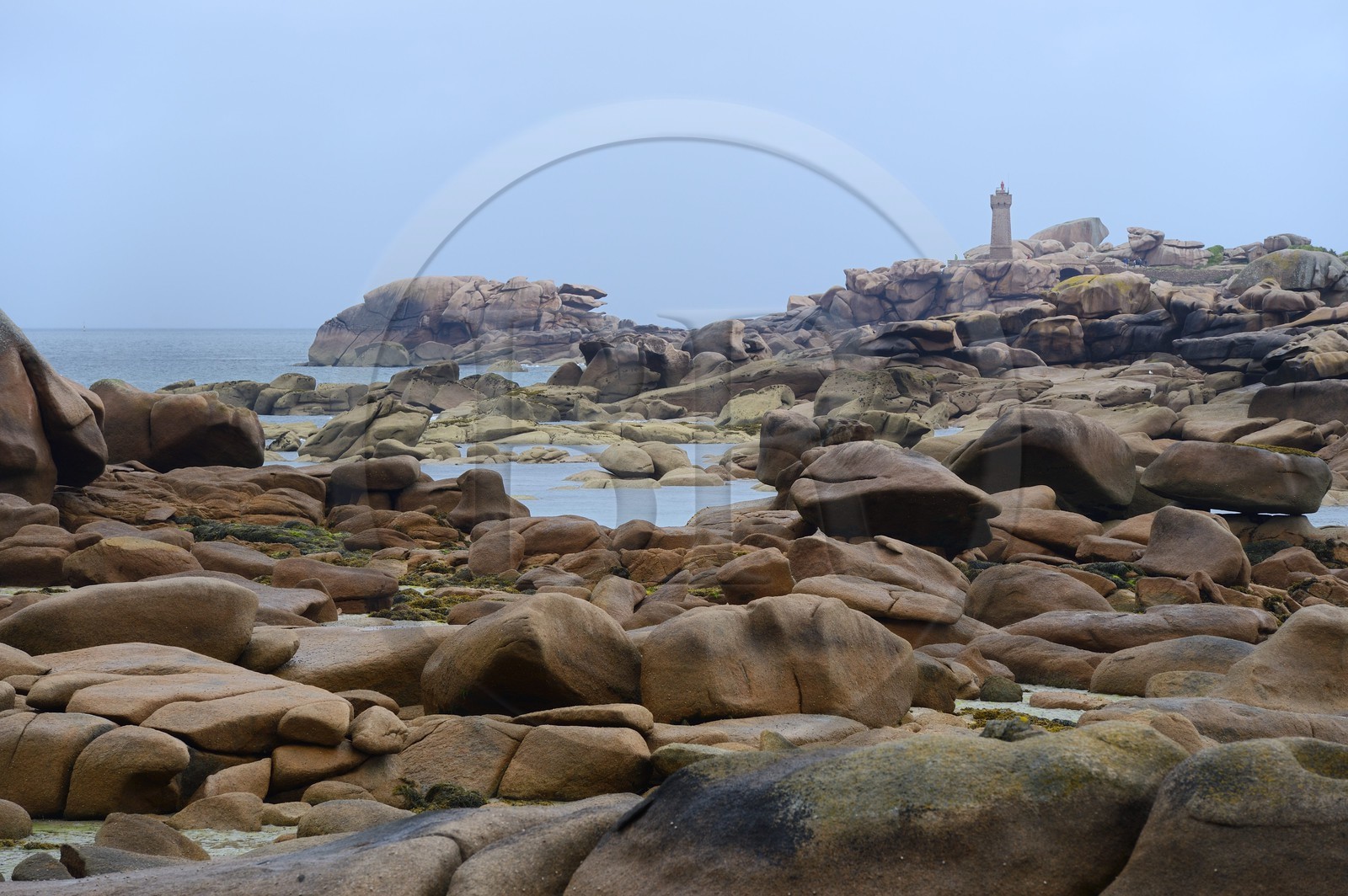France, Cotes-d'Armor, Cote de Granit Rose (the Pink Granite coast), Tregastel, Pointe de Squewel and Mean Ruz Lighthouse at Ploumanach seen from the Renote island