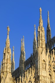 Italy, Lombardy, Milan, the Duomo in the historical center, cathedral in Gothic Flamboyant style, spires topped by statues