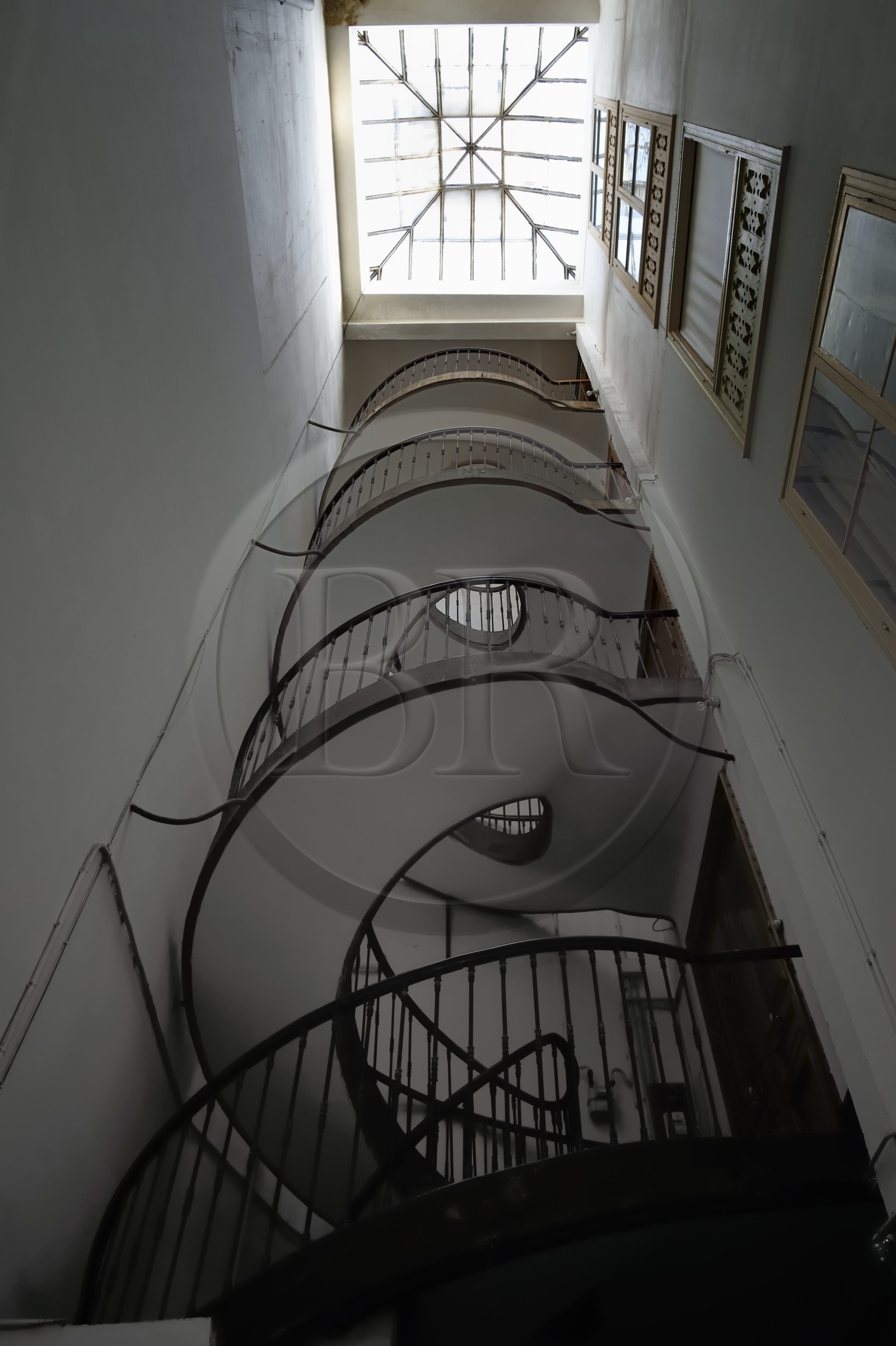 France, Pyrenees Atlantiques, Basque Country, Bayonne, helicoidal staircase with cast iron bars of a 19th century building on the rue du Port Neuf