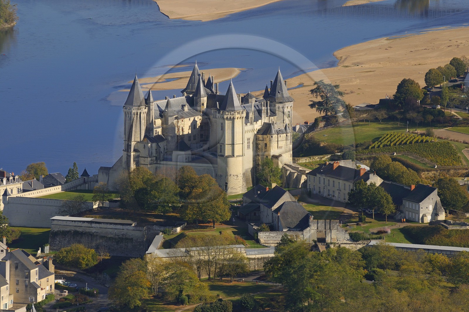 France, Maine et Loire, Loire Valley listed as World Heritage by UNESCO, Saumur, the castle on the Loire River banks (aerial view)