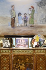 France, Alpes Maritimes, Cannes, the Villa La Californie where Picasso lived, today renamed the Pavillon de Flore by Marina Picasso, the living room, painting by Pablo Picasso entitled the Family and underneath family pictures of Marina Picasso