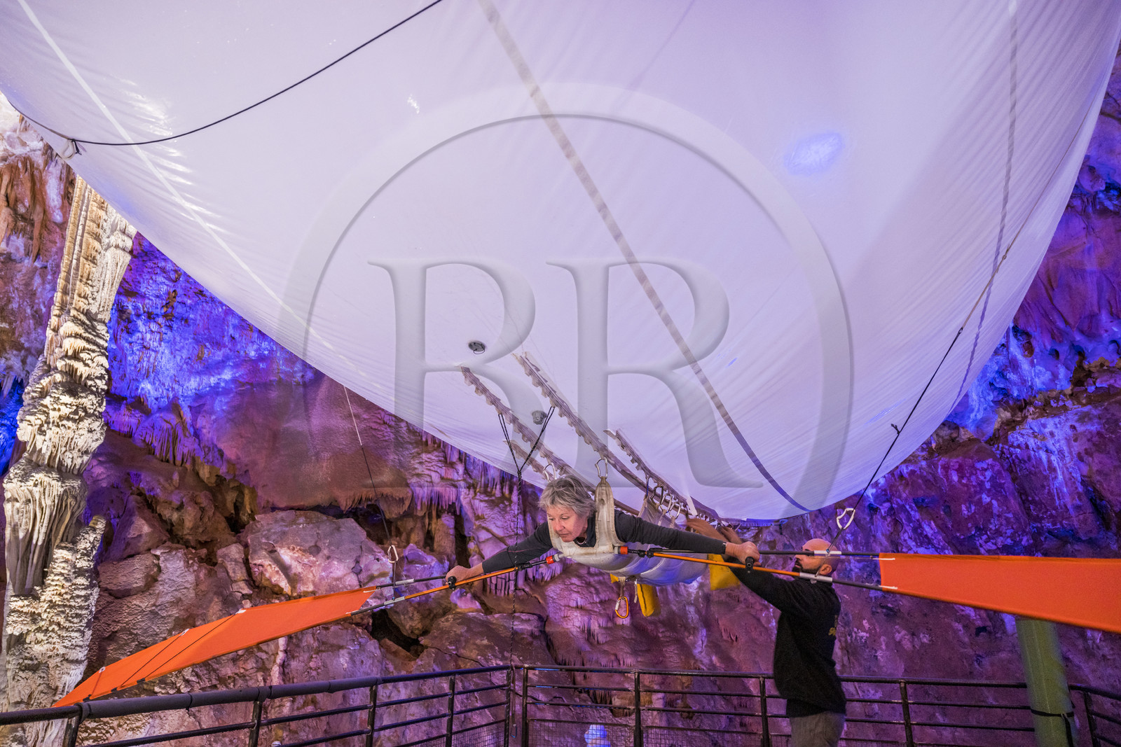 France, Gard, Mejannes-le-Clap, grotte de La Salamandre (Salamander cave), discovery of the cave in Aéroplume®, an individual dirigible balloon inflated with helium which allows you to fly away by flapping your wings