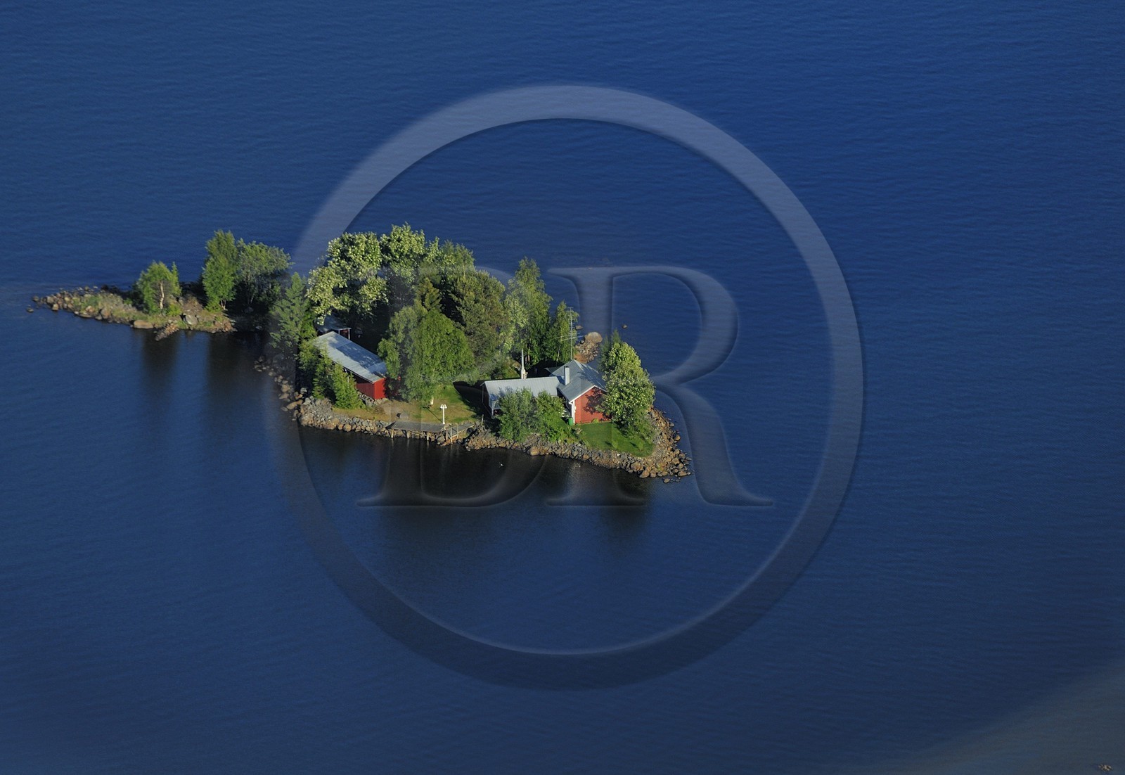 Sweden, Västerbotten County, region of Umea, Ytterboda village house on a small private island on the Baltic Sea (aerial view)