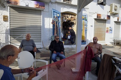 France, Haute Corse, Bastia, Terra-Vecchia district, meeting of former fishermen at their headquarters on the Old Port