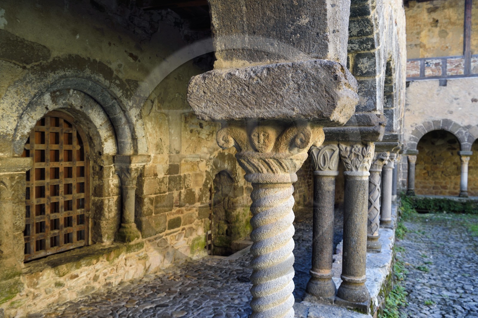 France, Haute Loire, Lavaudieu, labelled Les Plus Beaux Villages de France (The Most Beautiful Villages of France), the former Saint Andre (St Andrew) abbey church in Auvergne Romanesque style, the cloister