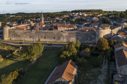 France, Aveyron, Causses and the Cévennes, cultural landscape of Mediterranean agro-pastoralism, listed as World Heritage by UNESCO, La Cavalerie, the Commandery of La Cavalerie, which became the Hospitaller Commandery of the Order of Saint John of Jerusalem, surrounded by its high ramparts (aerial view)