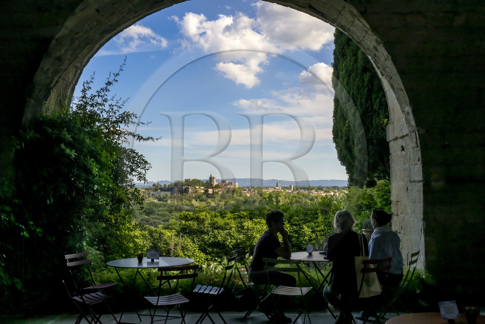 France, Gard, Villeneuve les Avignon, the gardens of the former Benedictine abbey of Saint André the Palais des Papes (Palace of the Popes) in Avignon classified as UNESCO World Heritage in the background