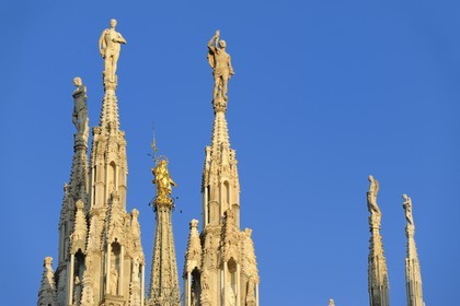 Italy, Lombardy, Milan, the Duomo in the historical center, cathedral in Gothic Flamboyant style, spires topped by statues