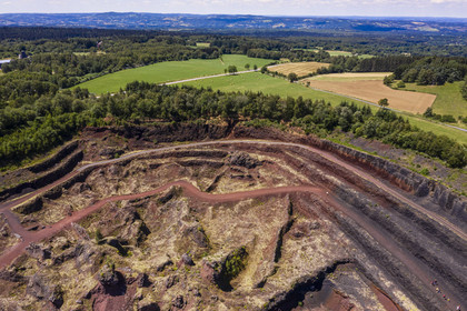 France, Puy de Dome, Parc Naturel Régional des Volcans d'Auvergne (regional nature park of Auvergne volcanoes), Chaine des Puys listed as World heritage by UNESCO, Saint Ours les Roches, Lemptegy volcano, a former pozzolan quarry that has become an educational site open to the public (aerial view)