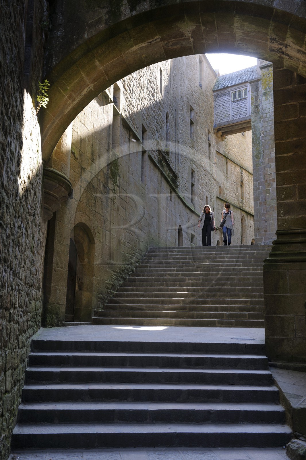 France, Manche, the abbey of Mont Saint Michel, listed as World Heritage by UNESCO, stairs of the Abbey church and the lodgings the left