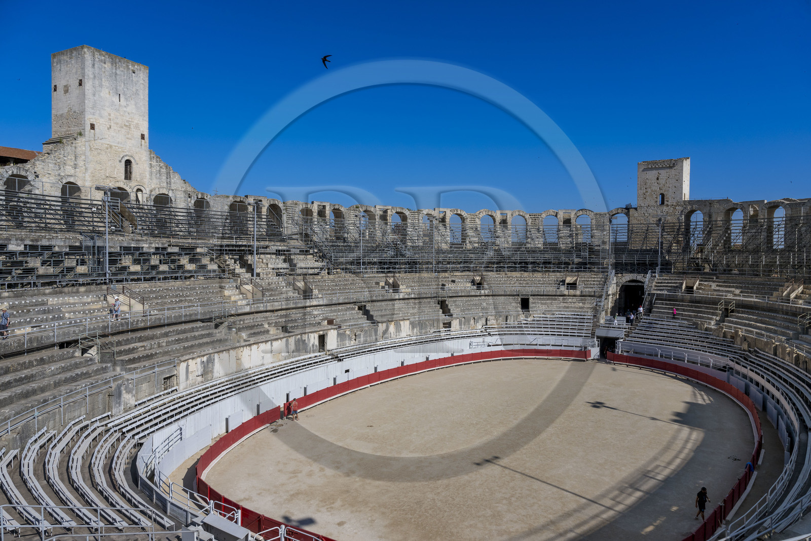 France, Bouches du Rhone, Arles, the Arena, a Roman amphitheater built around 80-90 AD, listed as World heritage by UNESCO, two of three remaining towers out of four built to make a fortress after the fall of the Roman Empire
