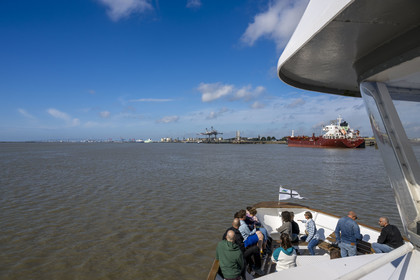 France, Loire Atlantique, Estuaire de la Loire, Saint Nazaire, the Grand port maritime de Nantes-Saint-Nazaire of Montoir-de-Bretagne and the Saint-Nazaire bridge in the background