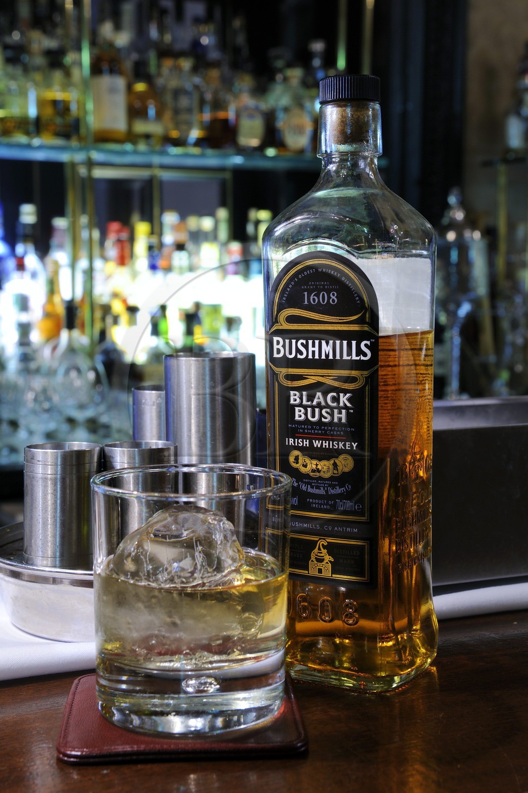 United Kingdom, Northern Ireland, Belfast, The Merchant Hotel bar in a former bank, bottle of Bushmills whiskey