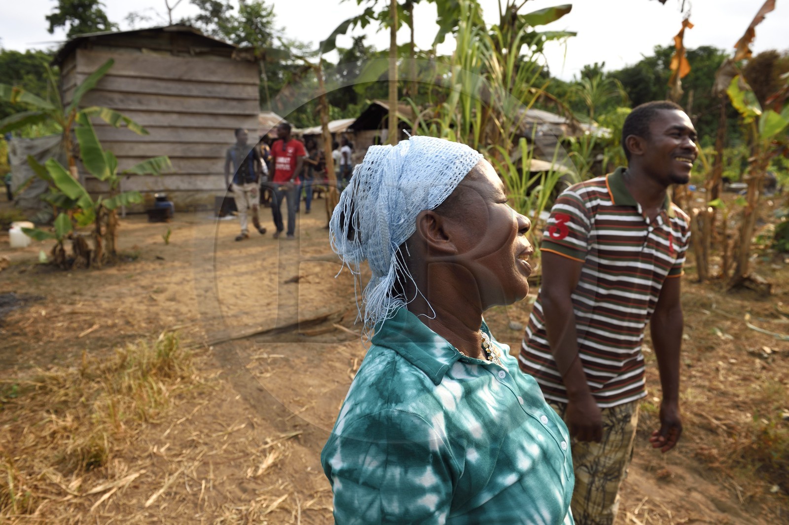 Gabon, Ogooue-Maritime Province, Omboue, Loango region, woman in front of her house