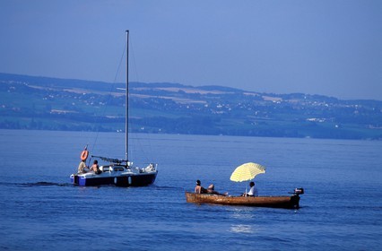 France, Haute Savoie, a small fishing boat on the Geneva lake (Leman lake)