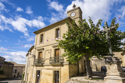 France, Gard, church square at Saint-Maximin, village on the path along the route of the Roman aqueduct of Nimes