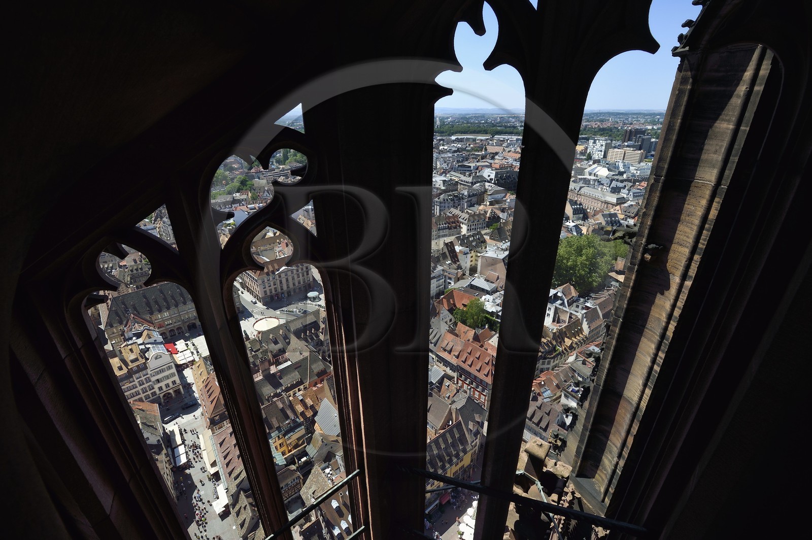 France, Bas Rhin, Strasbourg, old town listed as World Heritage by UNESCO, Notre Dame Cathedral, one of the four spiral staircases called the Vier Schnecken (four snails) that surround the 40-meter octagonal tower, Gutenberg square and place Kleber in the background