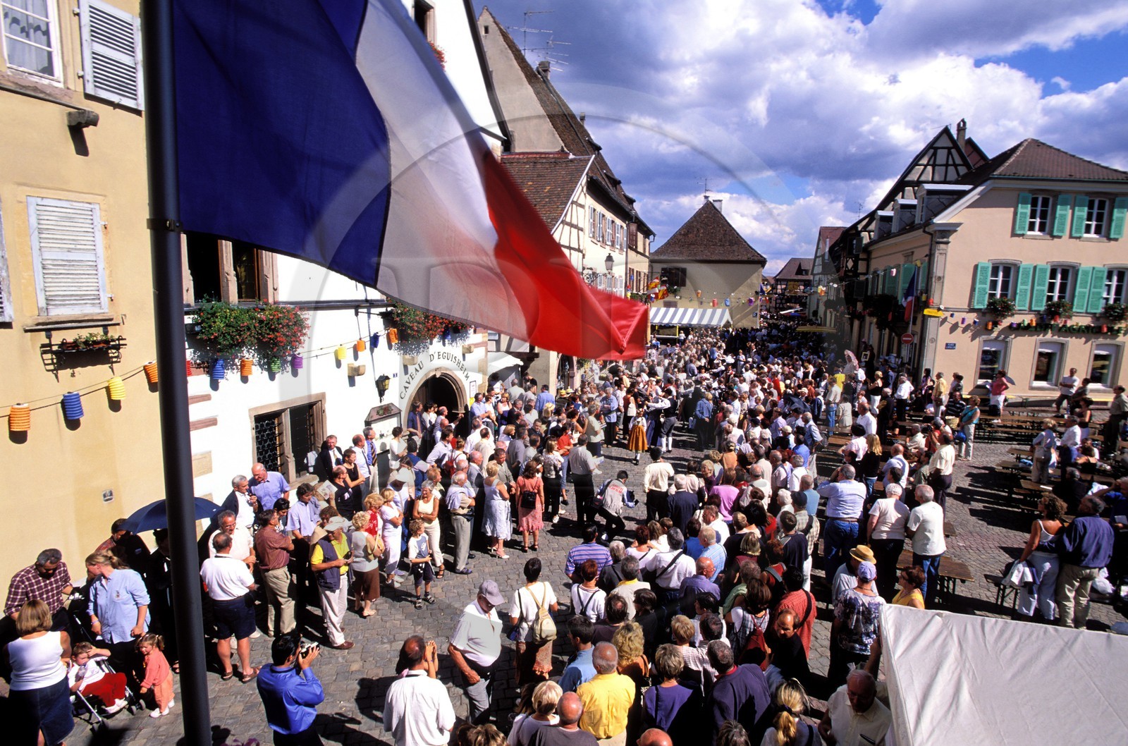 France, Haut Rhin, Eguisheim village, labelled Les Plus Beaux Villages de France (The Most Beautiful Villages of France), wine celebration, parade in costumes in the main road
