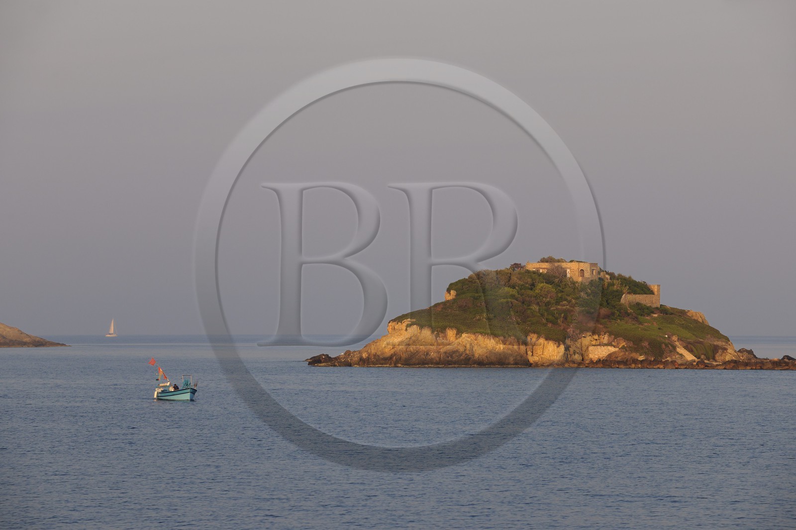 France, Var, Presqu'ile de Giens, around the Tour Fondue, fisherman in front of the privat island of the Petit Ribaud