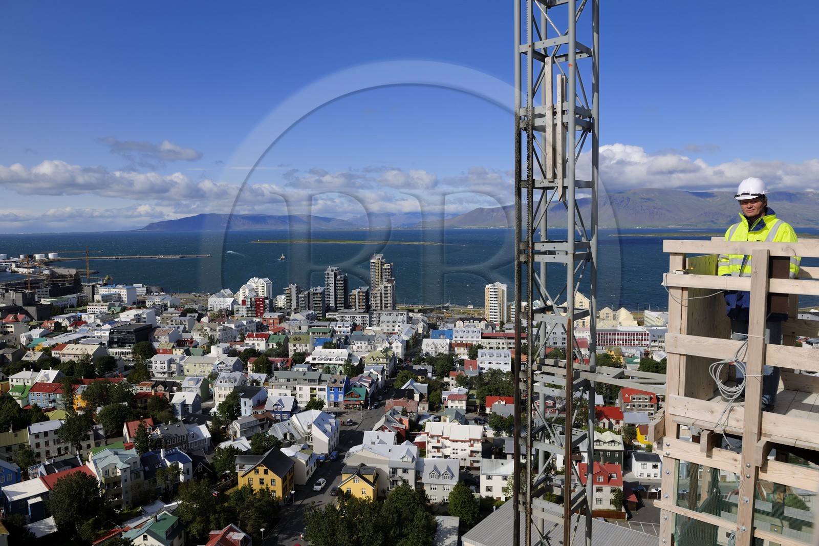 Iceland, Reykjavik, the old town and the harbor from the top of the church under construction Hallgrimskirkja Church