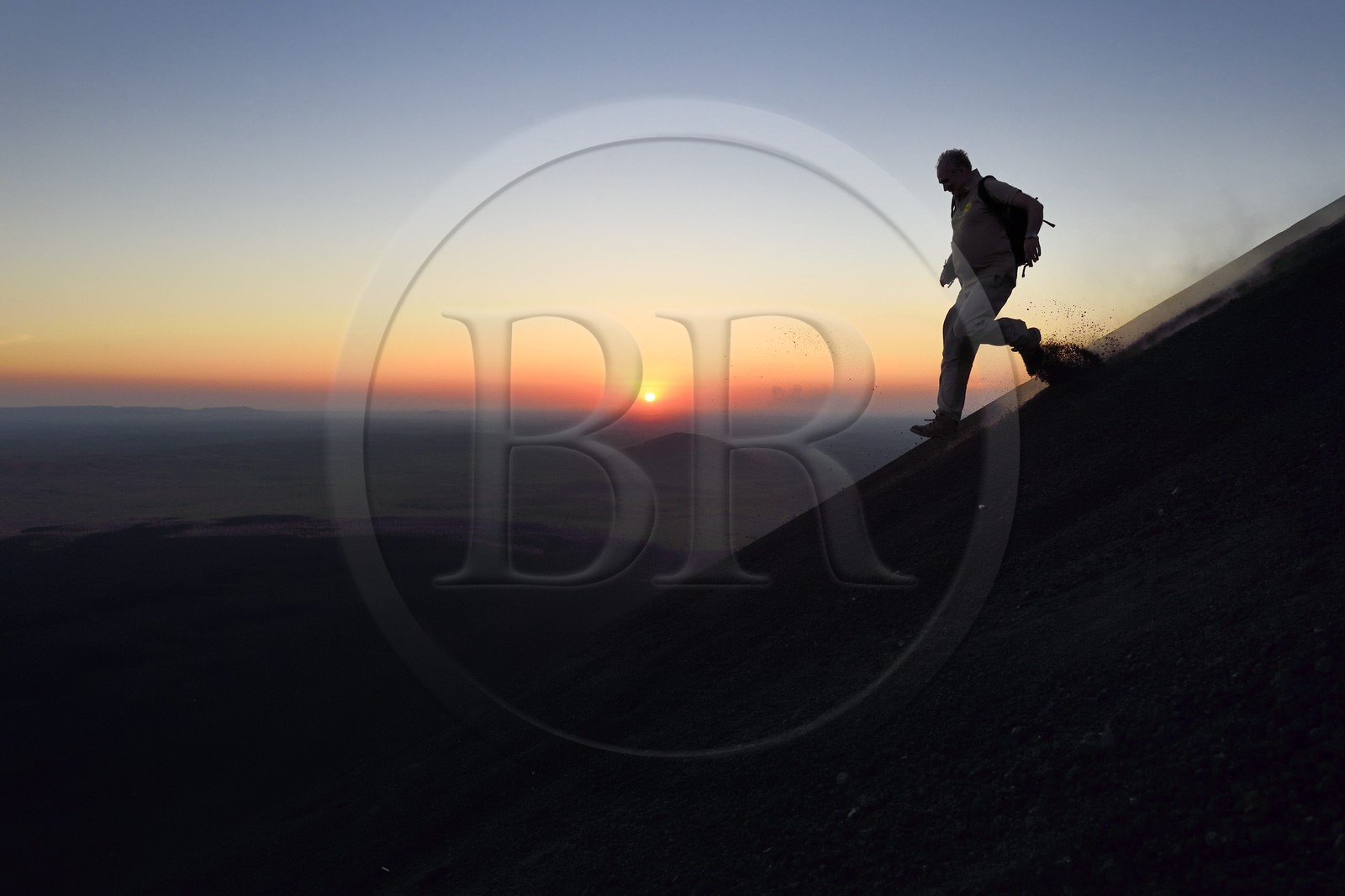 Nicaragua, Leon area, Volcan Cerro Negro in the Cordillera Maribios (or Marrabios), man running down volcano