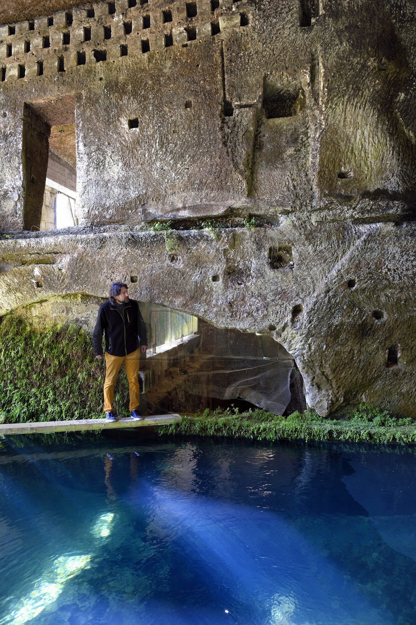 France, Dordogne, Brantome, Saint Pierre benedictine abbey, remains of the first troglodyte monastery built in the caves at the foot of the cliff, the water reservoir of the former troglodyte mill